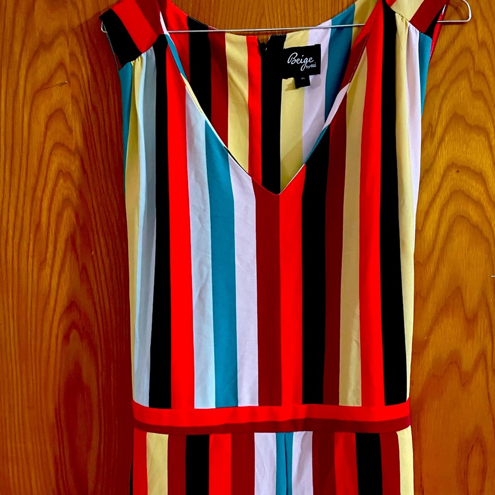 Stylish sleeveless multicolor romper. Great for summer outings or casual wear.